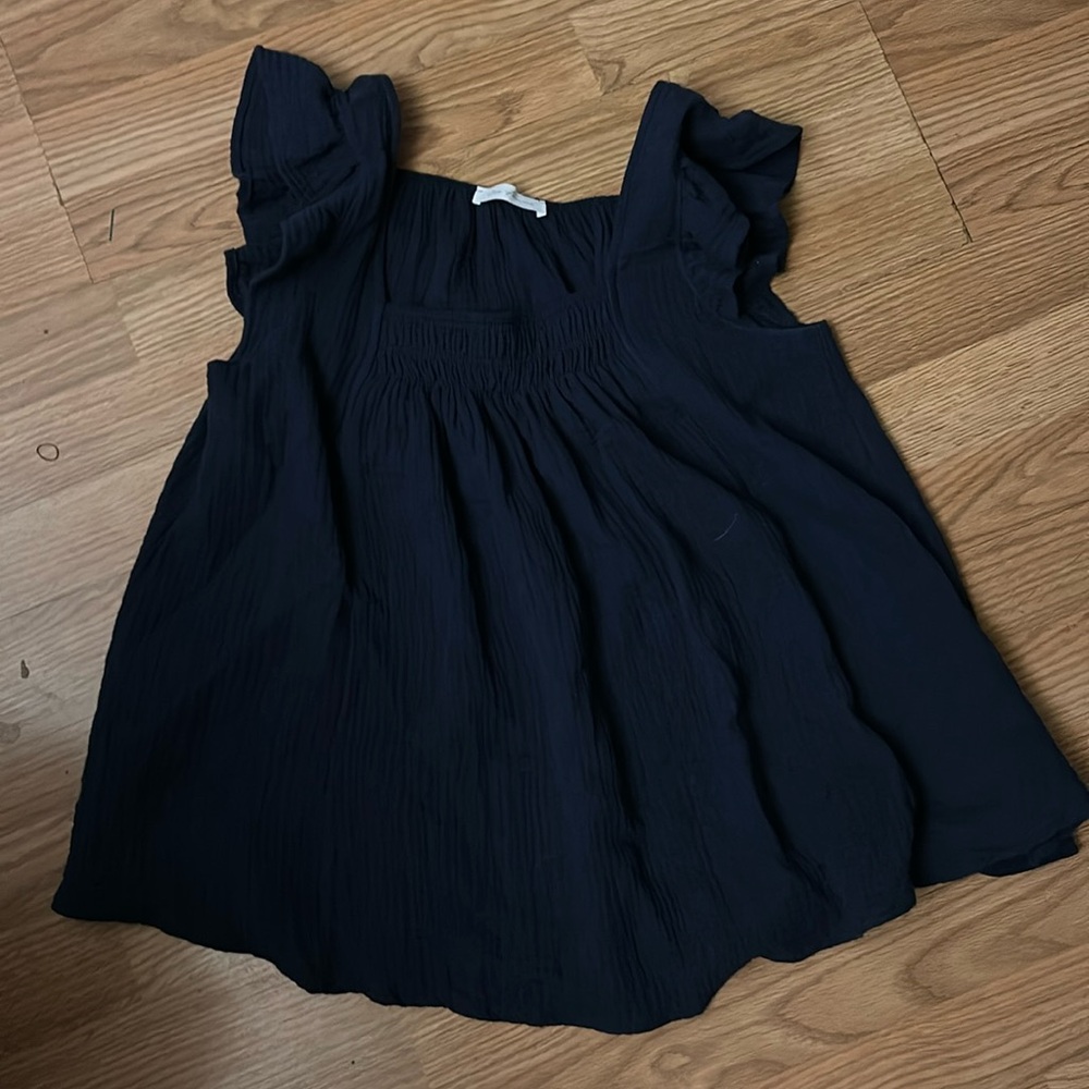 A navy blue Ces Femme woman’s top, no size marked.